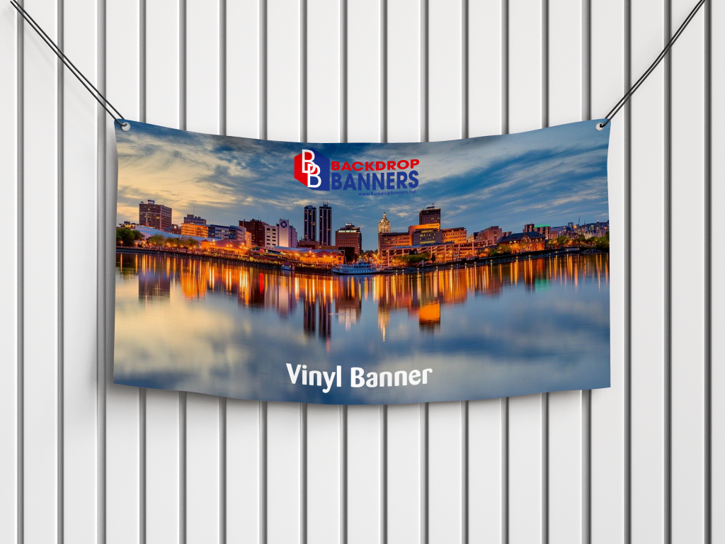 Outdoor vinyl banners showcasing product images and promotional text.